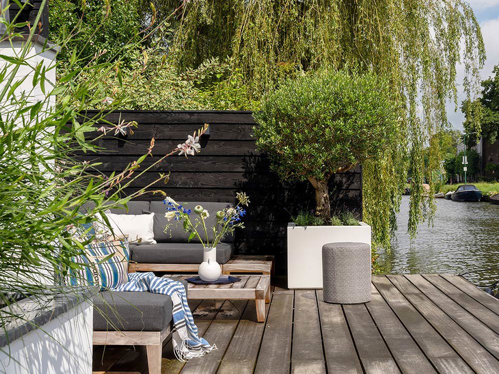 Teak tuinset kan tegen regen