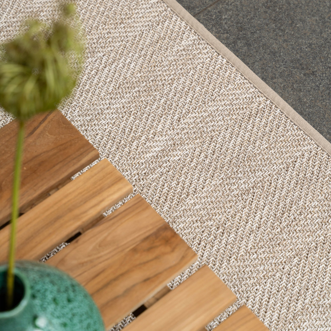beige vloerkleed buiten