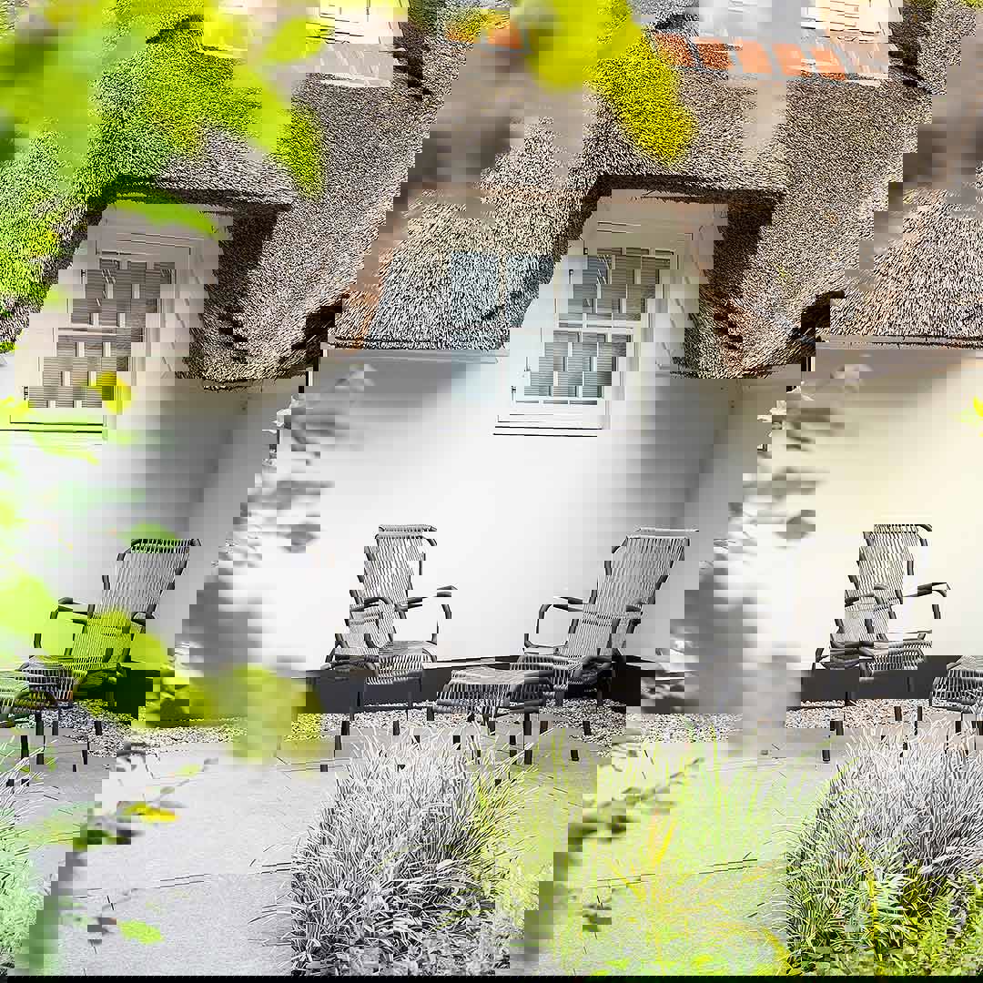 luxe tuinstoel met losse voetenbank